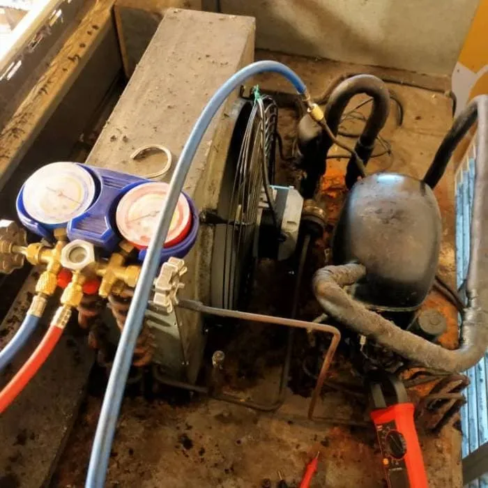 Diagnostic testing with refrigerant gauge